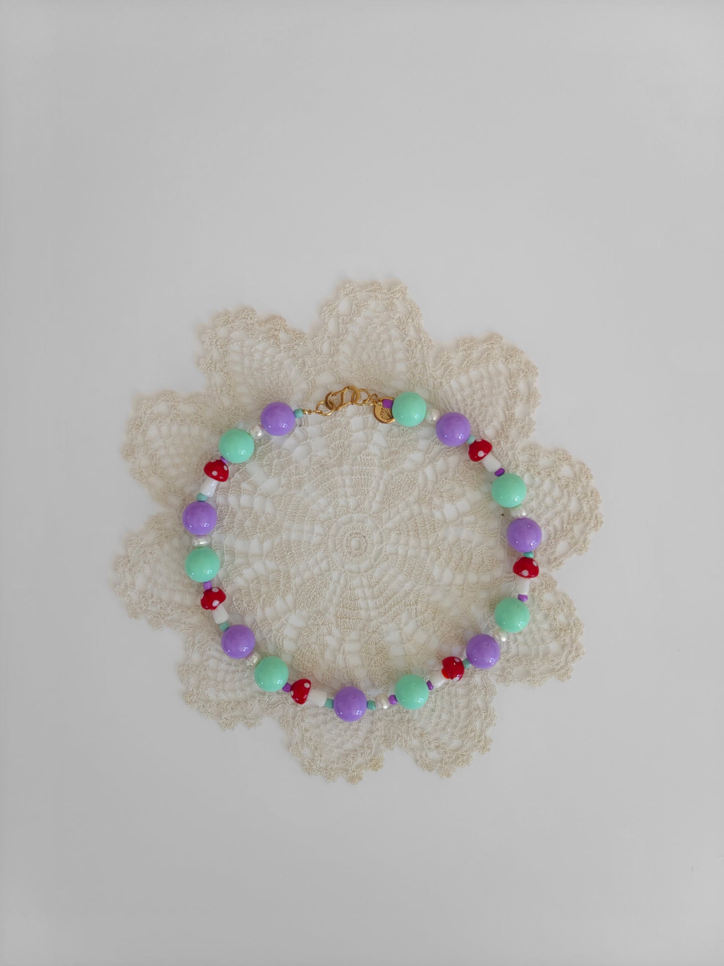 Collar seta lila y aguamarina