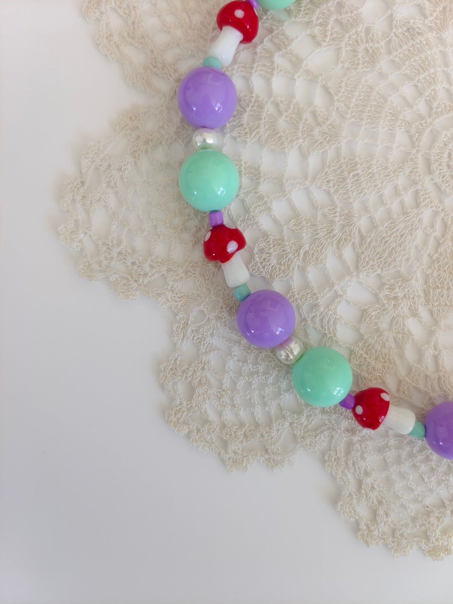 Collar seta lila y aguamarina