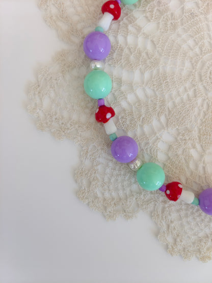 Collar seta lila y aguamarina